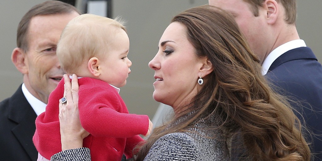 Kate, the Duchess of Cambridge, holds Prince George as they say goodbye before they board their flight in Canberra, Australia, Friday, April 25, 2014. The Duke and Duchess concluded their three week state visit by attending the Anzac Day dawn service and parade, laying a wreath and planting a Lone Pine tree before departing for London with son Prince George.(AP Photo/Rob Griffith)