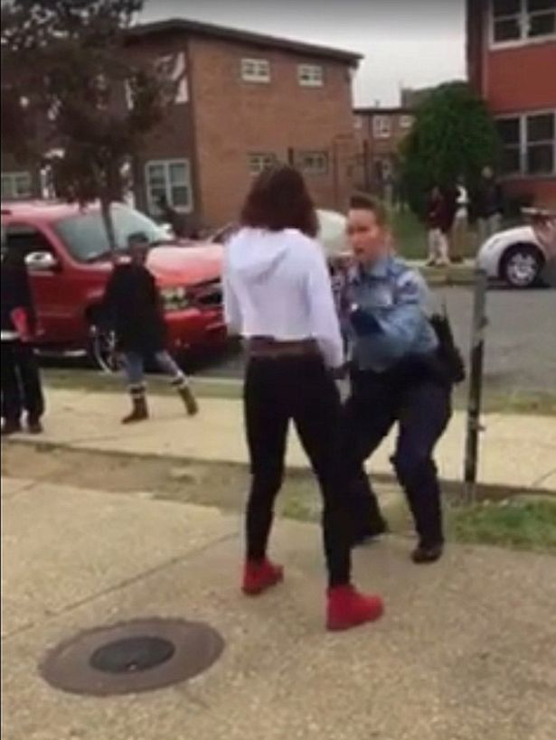 Teen-challenges-female-police-officer-to-Nae-Nae-dance-off