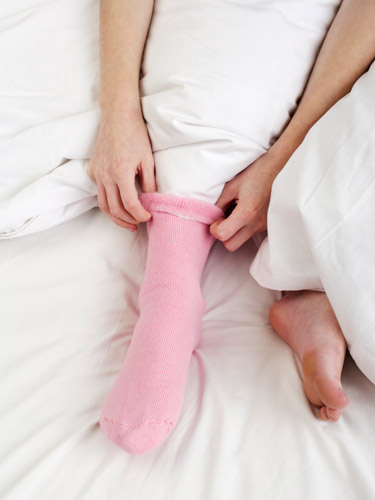 54825fe4cd06b_-_rby-woman-in-bed-pink-sock-de