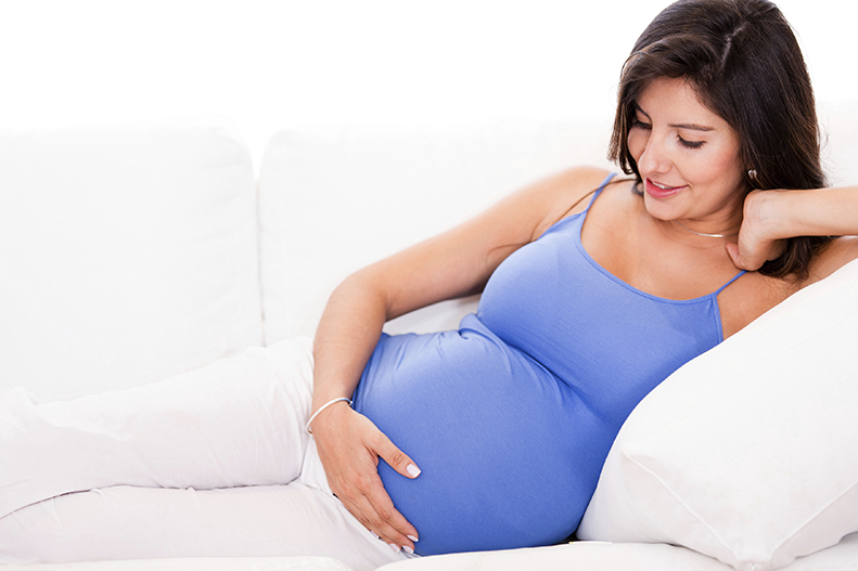 pregnant-woman-on-couch