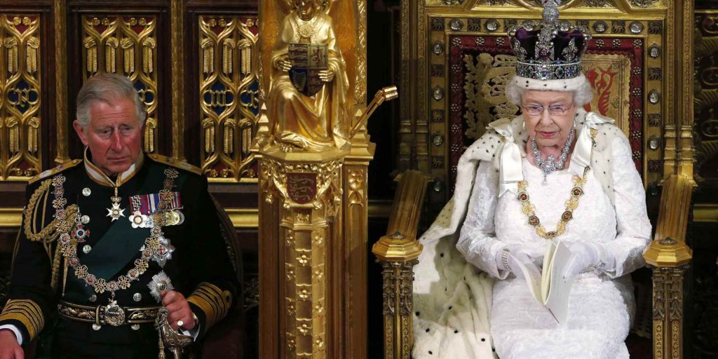 Britain's Queen Elizabeth II, right, sits with Prince Charles, as she delivers her speech in the House of Lords, during the State Opening of Parliament, at the Palace of Westminster, in London, Wednesday, June 4, 2014. The State Opening of Parliament is an annual pageant of pomp and politics centred on the Queen's Speech, a legislative program written by the government but read out by the monarch before a crowd of lawmakers, ermine-robed peers and ceremonial officials in bright garb evoking centuries past. (AP Photo/Suzanne Plunkett, Pool)