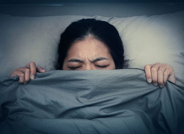 women-sleeping-bad-dream